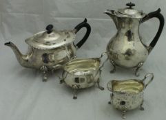 A Victorian silver teapot, coffee pot, cream jug and twin-handled sugar bowl (by Hutton & Sons Ltd,