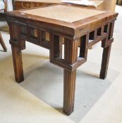 A Chinese elm framed coffee table CONDITION REPORTS Numerous surface scratxhes,
