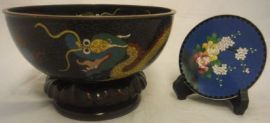 A Chinese cloisonné bowl decorated with five toed dragon chasing pearl raised upon a hardwood stand,