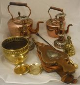Two copper kettles, a pair of copper candlesticks, an oak and leather set of bellows,