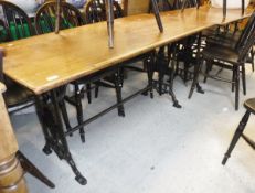 Two Victorian draughtsmans tables with mahogany tops and set with brass rules raised on matching
