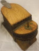 A large set of elm and leather bellows raised upon an oak base