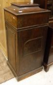 A Victorian mahogany cupboard, formerly a sideboard pedestal,