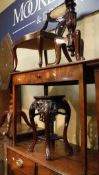 A Chinese hardwood stand with marble inset and top elaborately carved and pierced legs and