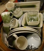 A box of dinner wares, possibly Italian, with cream and green glaze,