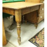 A pitch pine rectangular table on turned supports CONDITION REPORTS Height approx 73.