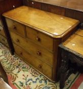 A Victorian mahogany chest of drawers, the plain top above two short and two long drawers,