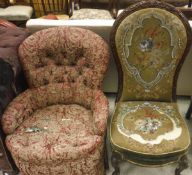 A mahogany framed salon chair with needlework upholstered seat and back on cabriole legs to white