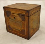 A 19th Century mahogany and satinwood single section tea caddy