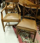 A set of ten Bevan Funnell Reprodux yew wood dining chairs with leather seats (8+2 carvers)