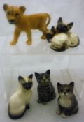 Five various porcelain figures to include Beswick figures of Siamese cats (1296),