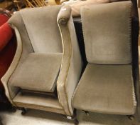A 19th Century low arm chair raised on cabriole front legs in sage velvet upholstery,
