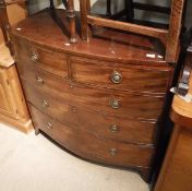 A 19th Century mahogany bow fronted chest of two short over three long drawers to splayed feet