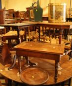 A 19th Century mahogany centre table on turned supports terminating in brown china castors,