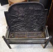 A cast iron fire back with cast iron fire grate