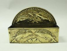 An early 20th Century Newlyn School brass and embossed candle box,