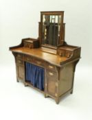 An Arts and Crafts mahogany dressng table,