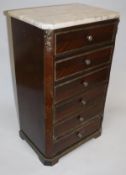 A small chest of six drawers in the French taste with white marble top,