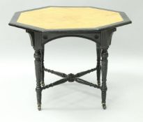 A Victorian ebonised centre table in the manner of Gillow,