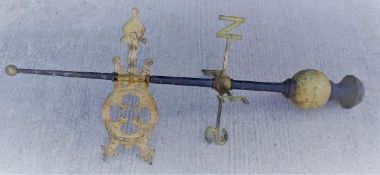 A Victorian cast iron and gold painted Gothic style weather vane of large proportions,