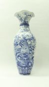 A Japanese Meiji period floor vase of baluster form, the flared rim over a collared neck,