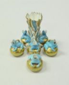 A collection of three Copeland majolica miniature vases/jugs in the form of frogs upon balls,