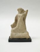 A Roman terracotta figure of female form,