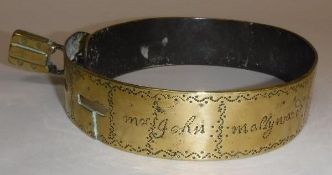 A 17th Century brass dog collar marked "Mr John Mallyward of....
