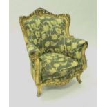 A pair of circa 1900 carved giltwood framed salon chairs in the Louis XV taste,