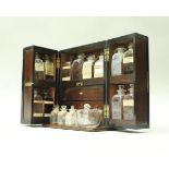 A 19th Century mahogany medicine cabinet,