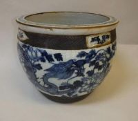 A Chinese crackle glazed blue and white vase decorated with four toed dragons amongst flowers and