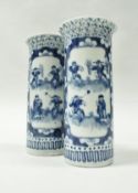 A pair of Chinese blue and white cylinder vases,