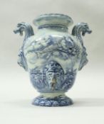 A 17th Century French faience inverted pear shaped water cistern,