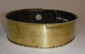 An 18th Centrury brass dog collar inscribed "Jam Rich Parkers Dog",