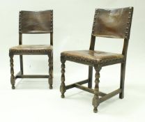 A set of four early 20th Century oak framed dining chairs in the Cromwellian manner,