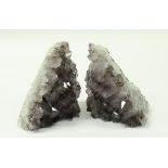 A pair of amethyst geode book ends,
