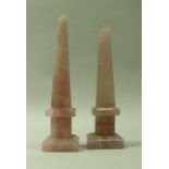 A near-matching pair of rose quartz obelisks,