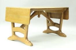 A Cotswold School oak sofa table,