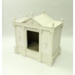 A painted wooden dog kennel of Palladian architectural form,