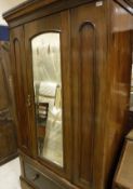 A Victorian mahogany single door wardrobe,