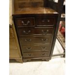 A pair of walnut bedside cabinets with single drawers above cupboard doors to cabriole legs,