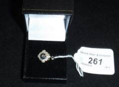 A diamond and sapphire 18 carat gold dress ring, approx total weight 4.
