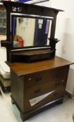 An early 20th Century oak dressingchest in the Arts and Crafts manner,