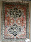 A fine silk rug,