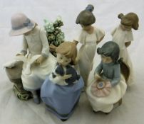 Five Nao figurines of young girls