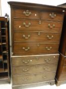 A 19th Century mahogany chest on chest, the upper section with two short over three long drawers,