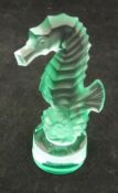 A Lalique sea horse in green CONDITION REPORTS Has general wear and tear conducive