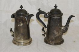 A George V silver coffee pot in the Queen Anne manner raised on a stepped circular base with