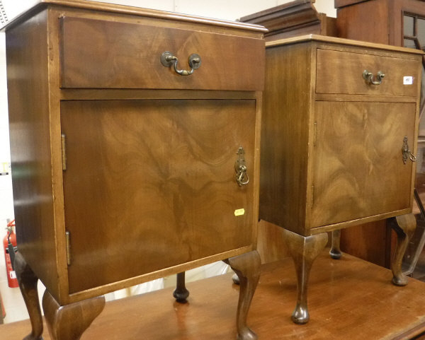 A pair of walnut bedside cabinets with single drawers above cupboard doors to cabriole legs, - Image 2 of 2