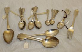 A box of assorted silver teaspoons, dessert spoons,